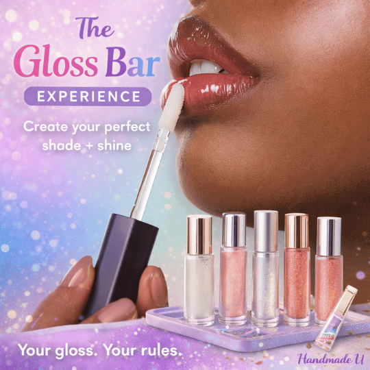 Lip gloss product with applicator and lip gloss tubes on a colorful background with 'The Gloss Bar' branding.